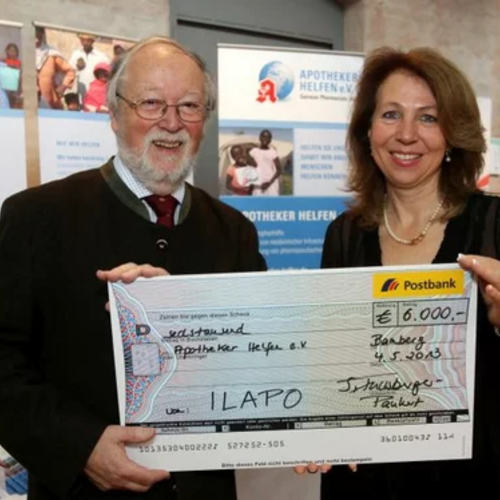 People holding a check